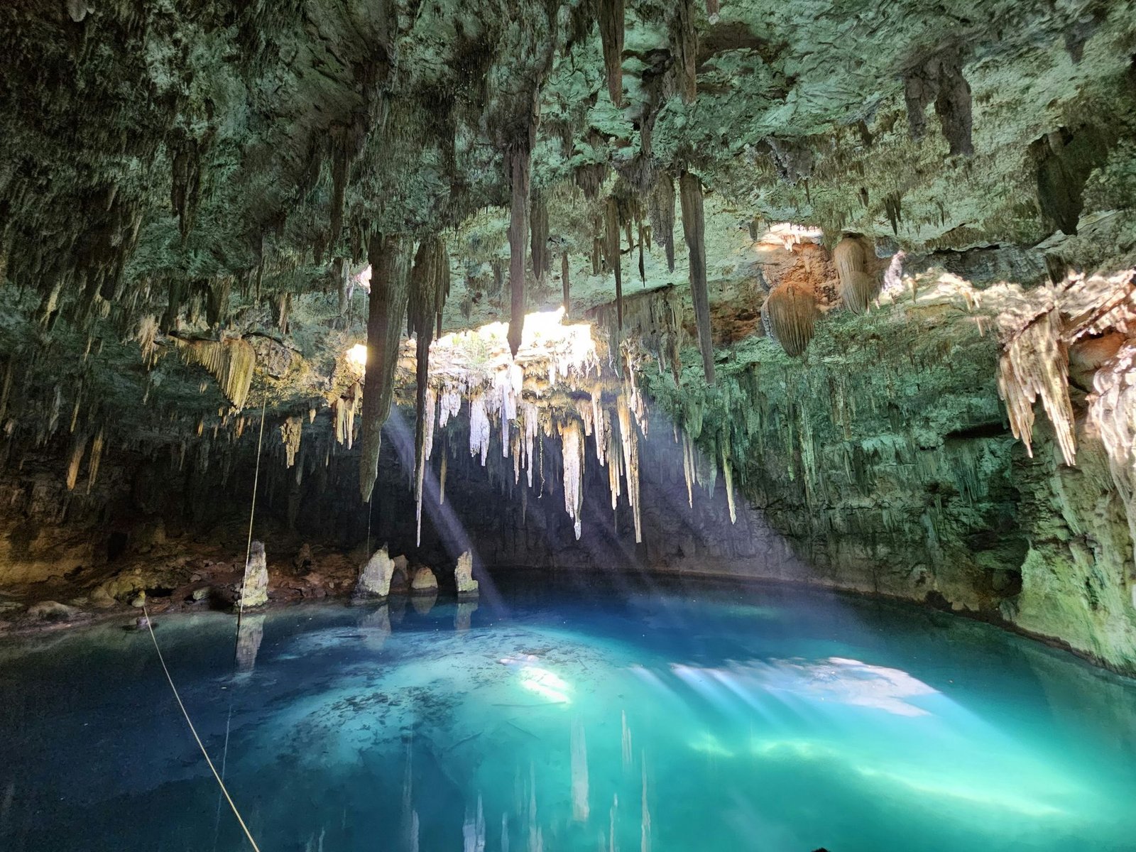 Cave cenote with turquoise water